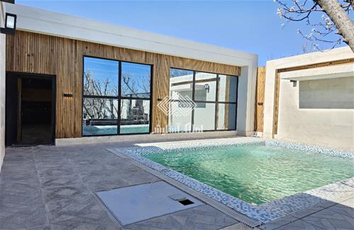 320 متر باغ ویلای نقلی و نوساز در منطقه اسفند آباد ملارد